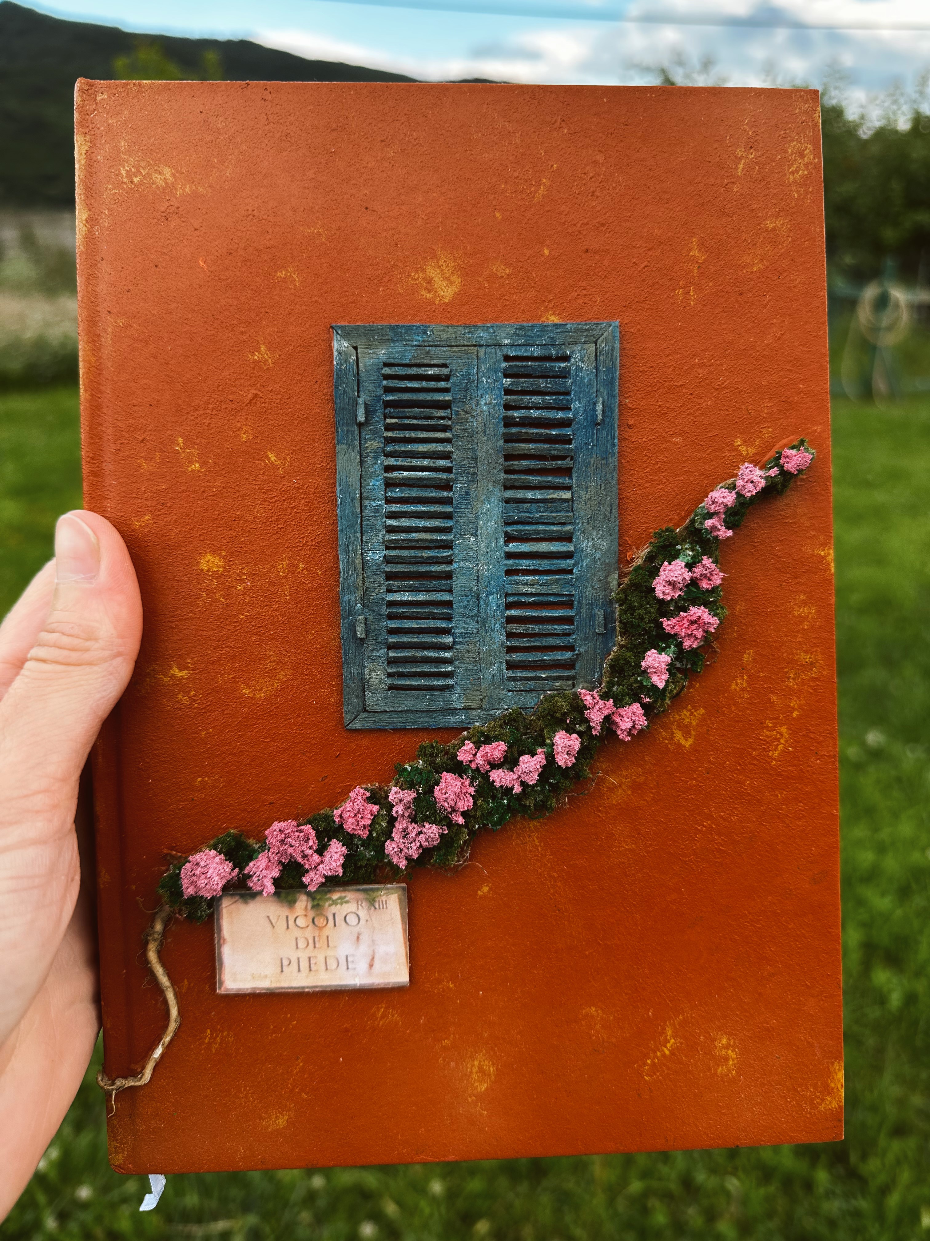 A diary with an Italian street facade